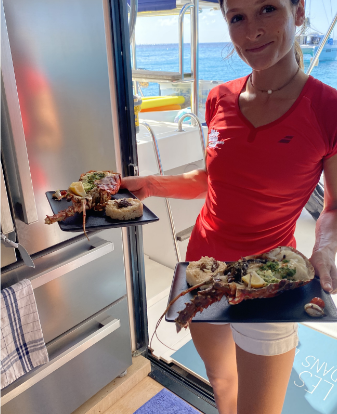 owner Alisson serving Lobster on board Ever Glorious