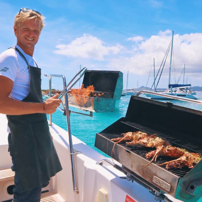 Captain Max cooking with the Onboard BBQ