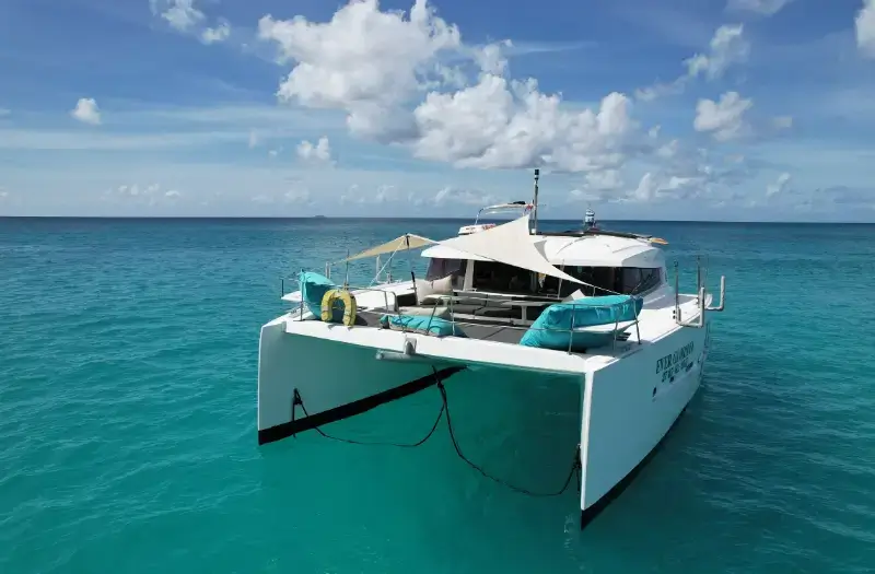 Motor cataraman Ever Glorious anchored near Shell Beach, in St Barts