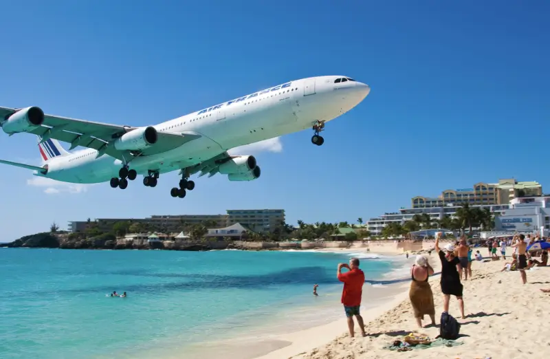 Plane landing at maho bay sint maarten