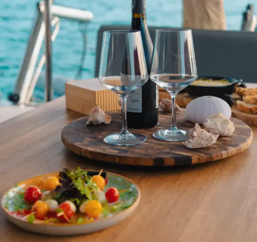 Food and wine onboard a boat charter in St Barts