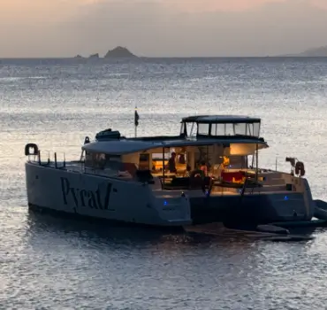 Motor catamaran from Pyratz anchored in St Barts during an overnight boat charter