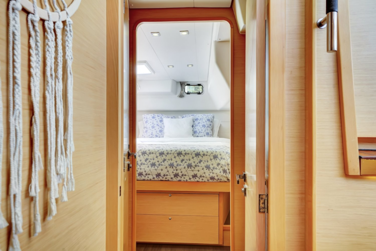 One of the cabins on the sailing catamaran where guests sleep during our overnight boat charters