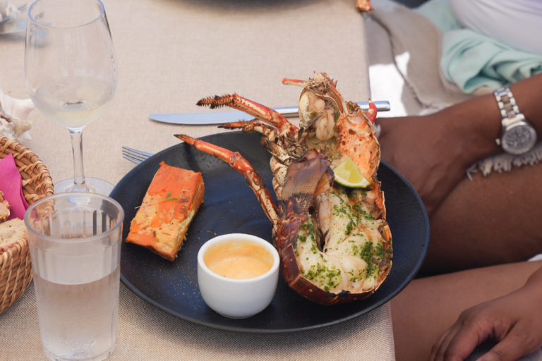 Grilled lobster served during our sunset dinner boat charter in St Martin